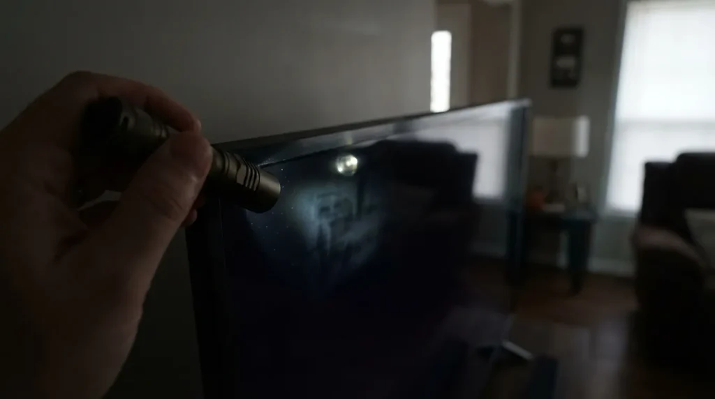 Flashlight test for TV backlight failure on a Toshiba TV