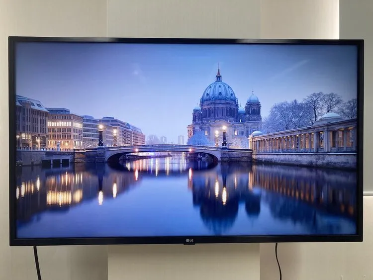 LG TV screen showing AI-generated screensaver in webOS 25.